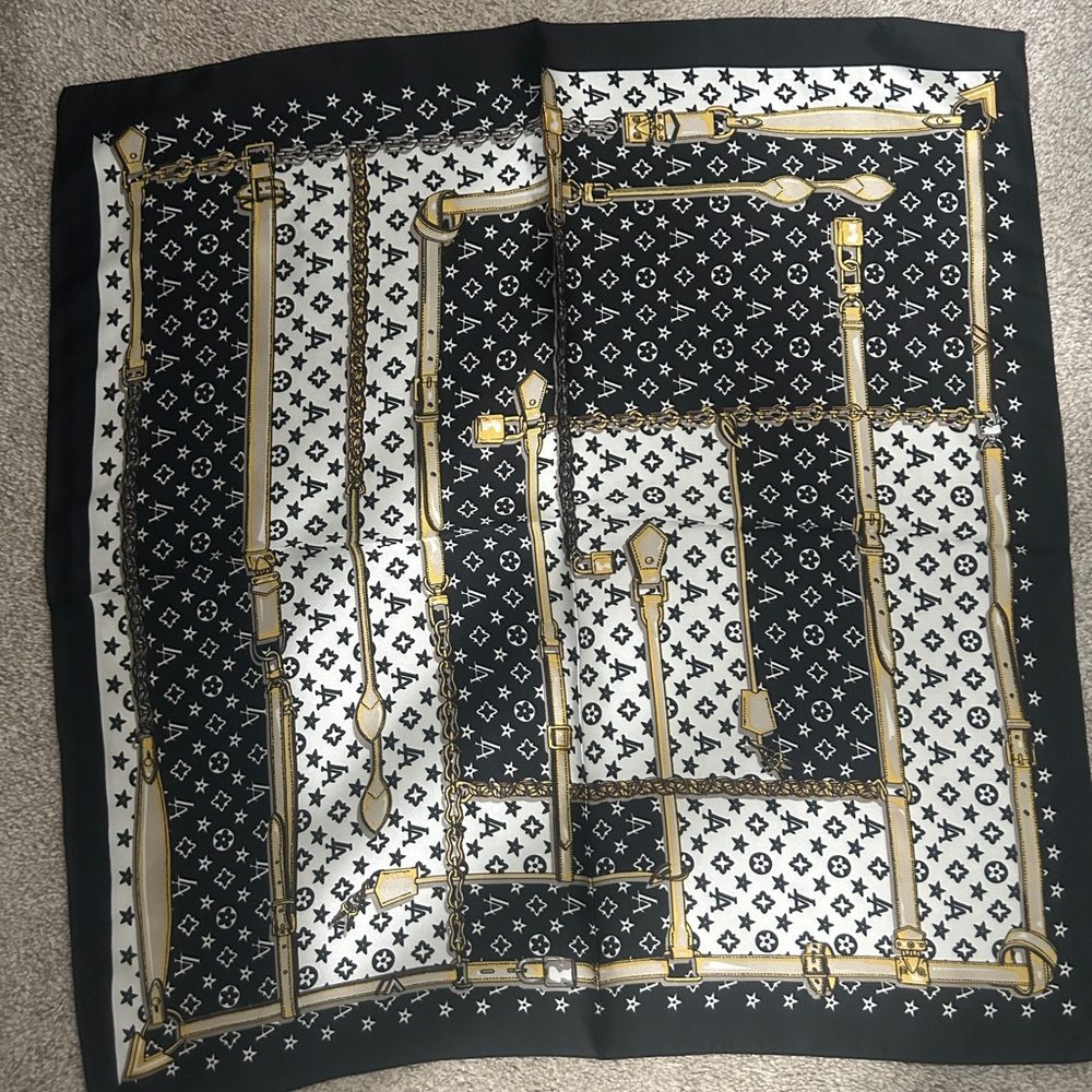 Black and White Patterned Scarf with Gold Accents